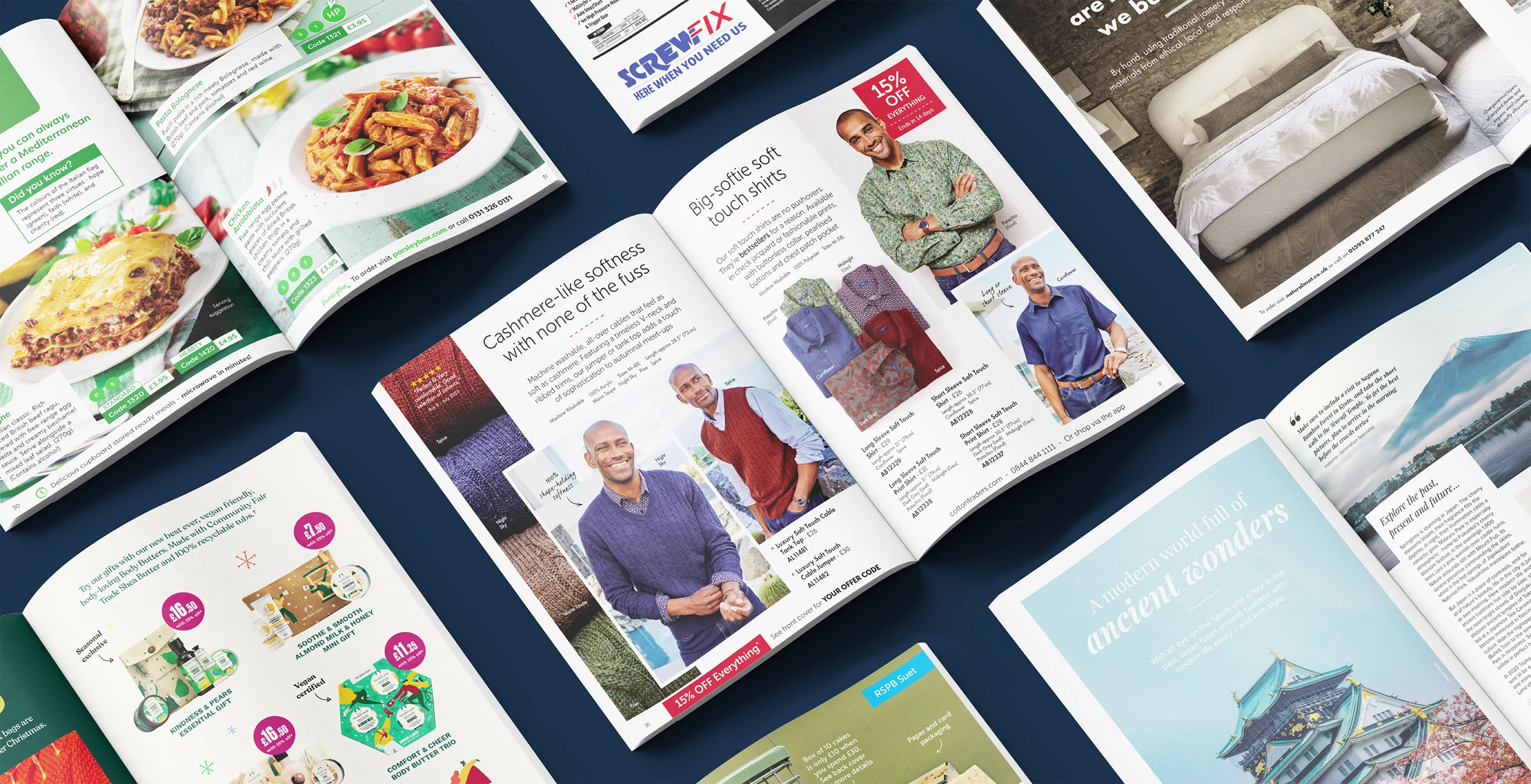 A collection of redesigned catalogues laid out together, including Screwfix, Naturalmat and Cotton Traders
