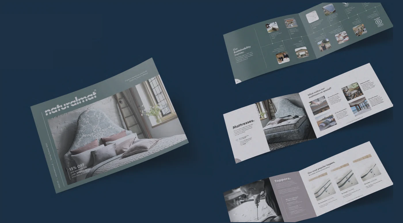 Mockup of Naturalmat's previous Spring 2023 catalogue, an A5 landscape format, shown as a cover and two folded spreads